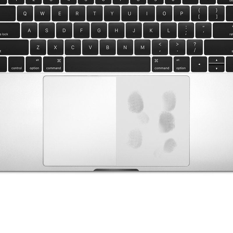 Split view of a MacBook trackpad, with GhostCover Touch keeping one half fingerprint-free while the uncovered half shows visible fingerprint smudges.