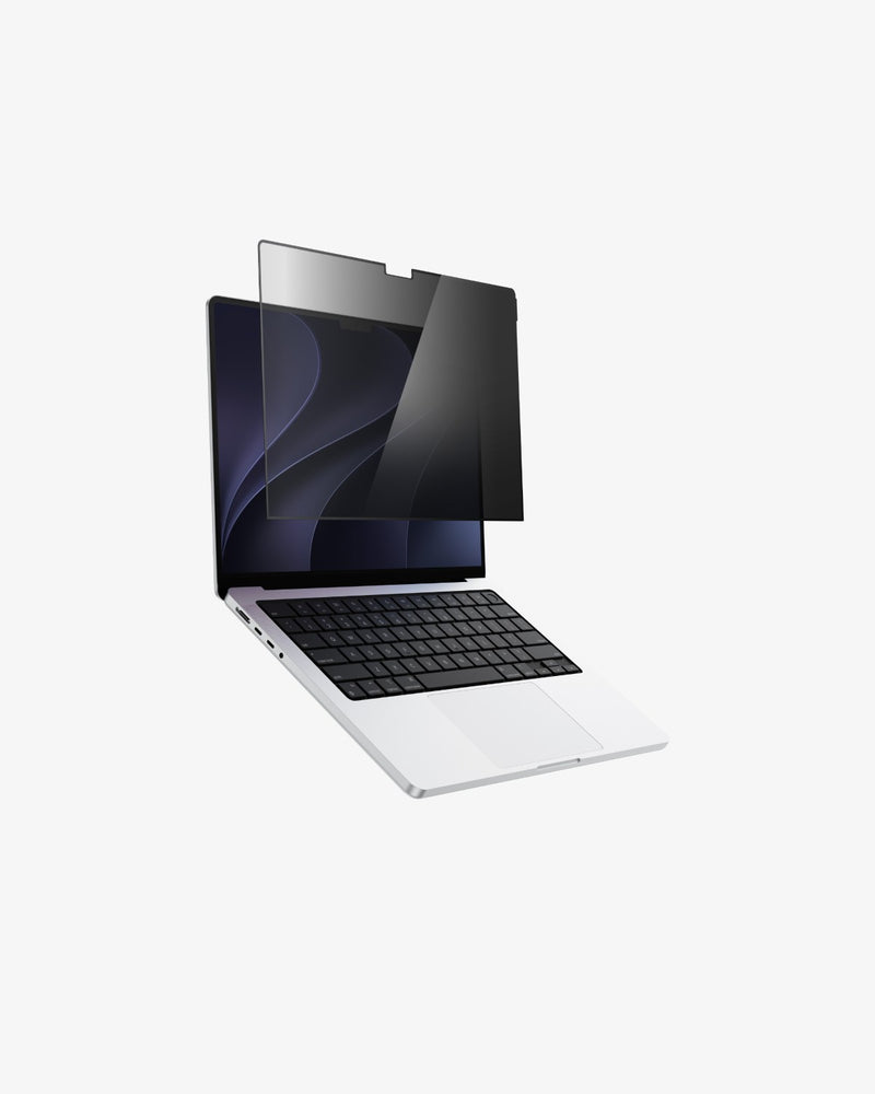 MacBook Pro with GhostView privacy screen filter attached, display darkened when seen from an angle