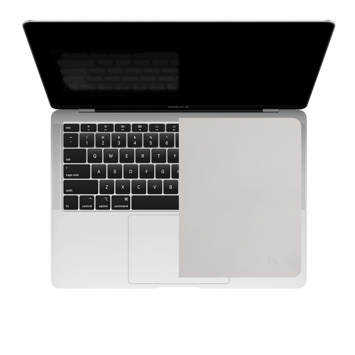 Top-down view of a MacBook with the GhostBlanket liner covering the keyboard and trackpad